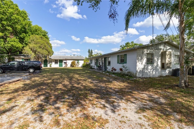 658, 660, 662 24th St NW, Winter Haven, FL 33880 - ranch-style home with a front lawn