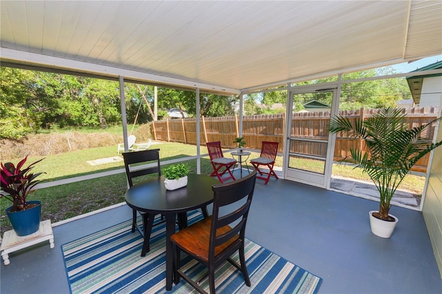 sunroom / solarium with a healthy amount of sunlight