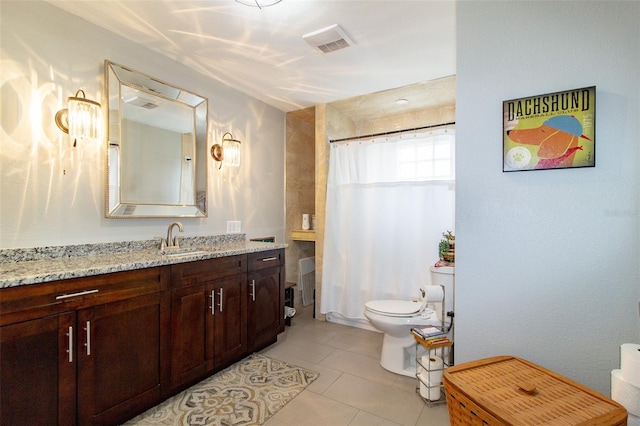full bathroom with vanity, toilet, tile patterned floors, visible vents, and curtained shower