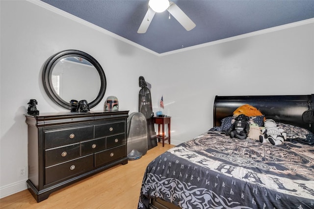 202 Saint Lucie Rd, Winter Haven, FL 33884 - bedroom featuring crown molding, wood finished floors, a ceiling fan, and baseboards