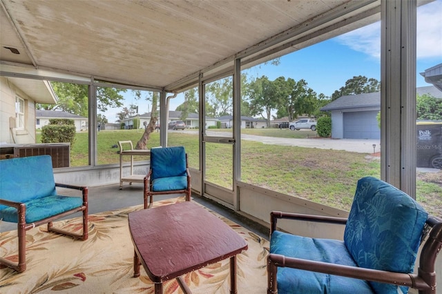 202 Saint Lucie Rd, Winter Haven, FL 33884 - sunroom / solarium featuring a residential view