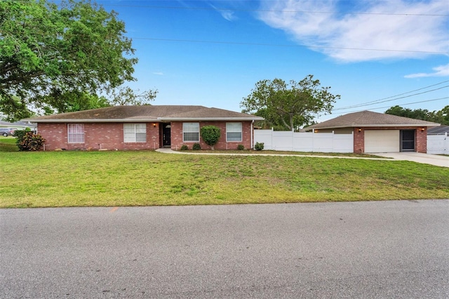 202 Saint Lucie Rd, Winter Haven, FL 33884 - single story home with concrete driveway and brick siding