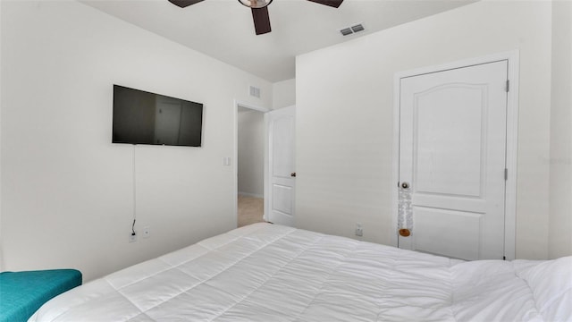 bedroom featuring a ceiling fan and visible vents