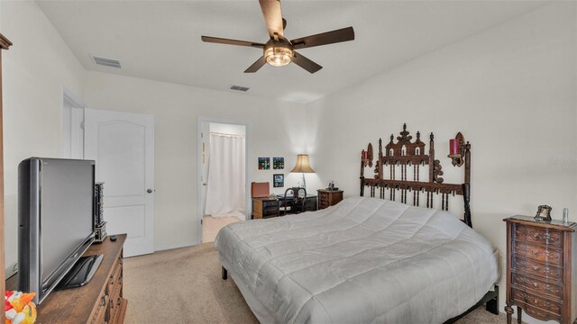 bedroom featuring light carpet, baseboards, visible vents, and ceiling fan