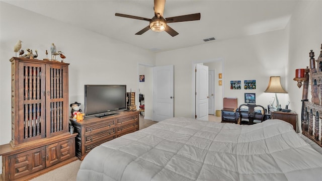 bedroom featuring ceiling fan and visible vents