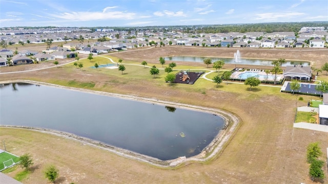 aerial view featuring a residential view and a water view