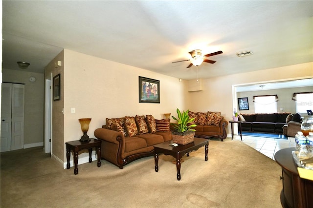 1618 Crystalview Trl, Lakeland, FL 33801 - living area featuring ceiling fan, light carpet, and baseboards