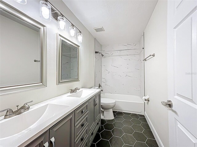 2042 Windward Pass, Lakeland, FL 33813 - full bath with visible vents, shower / tub combination, a sink, and toilet