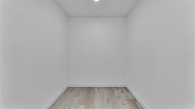 interior space with light wood-type flooring and baseboards