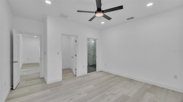 unfurnished bedroom featuring light wood-style floors, visible vents, and recessed lighting