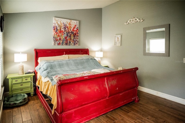 811 W Heron Pl, Winter Haven, FL 33884 - bedroom with vaulted ceiling and hardwood / wood-style flooring