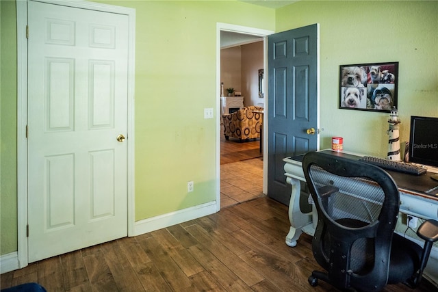 811 W Heron Pl, Winter Haven, FL 33884 - office area with dark wood finished floors and baseboards