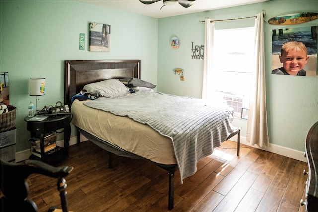 811 W Heron Pl, Winter Haven, FL 33884 - bedroom with wood finished floors and baseboards