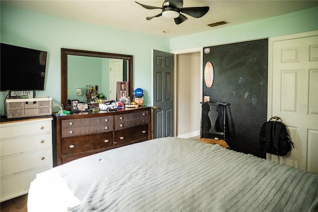 811 W Heron Pl, Winter Haven, FL 33884 - bedroom with baseboards and ceiling fan