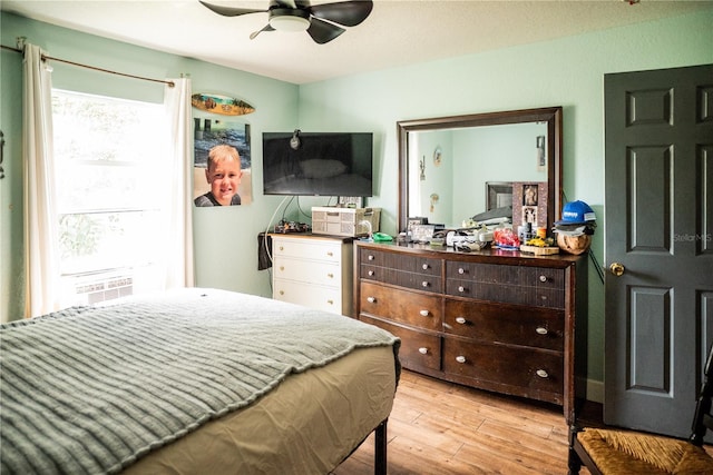 811 W Heron Pl, Winter Haven, FL 33884 - bedroom featuring light wood-style flooring and a ceiling fan