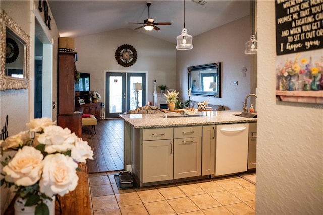 811 W Heron Pl, Winter Haven, FL 33884 - kitchen featuring dishwasher, open floor plan, vaulted ceiling, ceiling fan, and light tile patterned floors