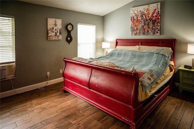 811 W Heron Pl, Winter Haven, FL 33884 - bedroom with hardwood / wood-style floors and baseboards