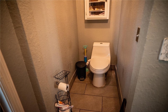811 W Heron Pl, Winter Haven, FL 33884 - bathroom featuring toilet and tile patterned flooring