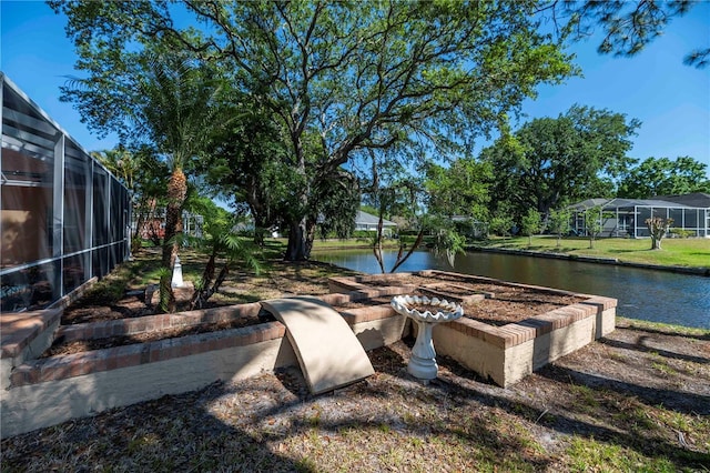 surrounding community with a water view