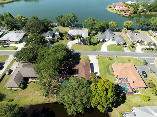 aerial view featuring a residential view and a water view