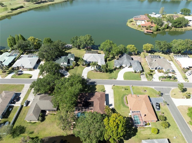 bird's eye view with a residential view and a water view
