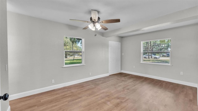 1650 W Mcleod St, Bartow, FL 33830 - unfurnished room featuring healthy amount of natural light, ceiling fan, and wood finished floors
