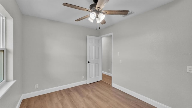 1650 W Mcleod St, Bartow, FL 33830 - empty room featuring ceiling fan, light wood-style floors, and baseboards