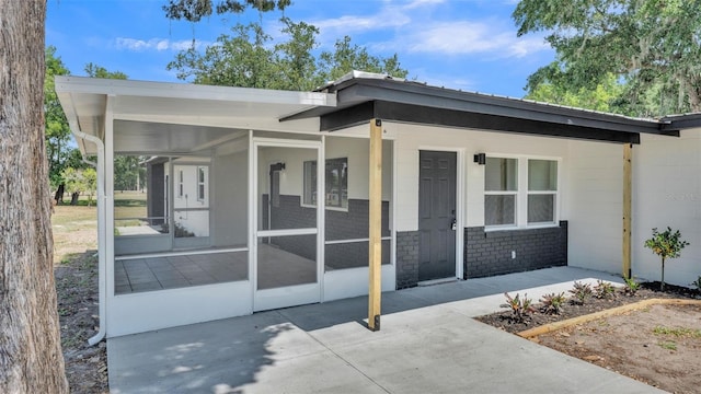 1650 W Mcleod St, Bartow, FL 33830 - doorway to property with concrete block siding