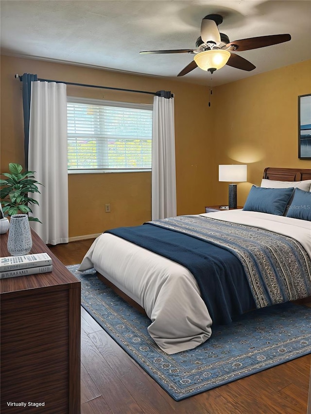 1135 Palace Pl, Lakeland, FL 33813 - bedroom with wood finished floors and a ceiling fan