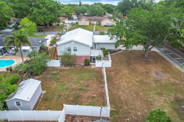 1135 Palace Pl, Lakeland, FL 33813 - aerial perspective of suburban area with a pool