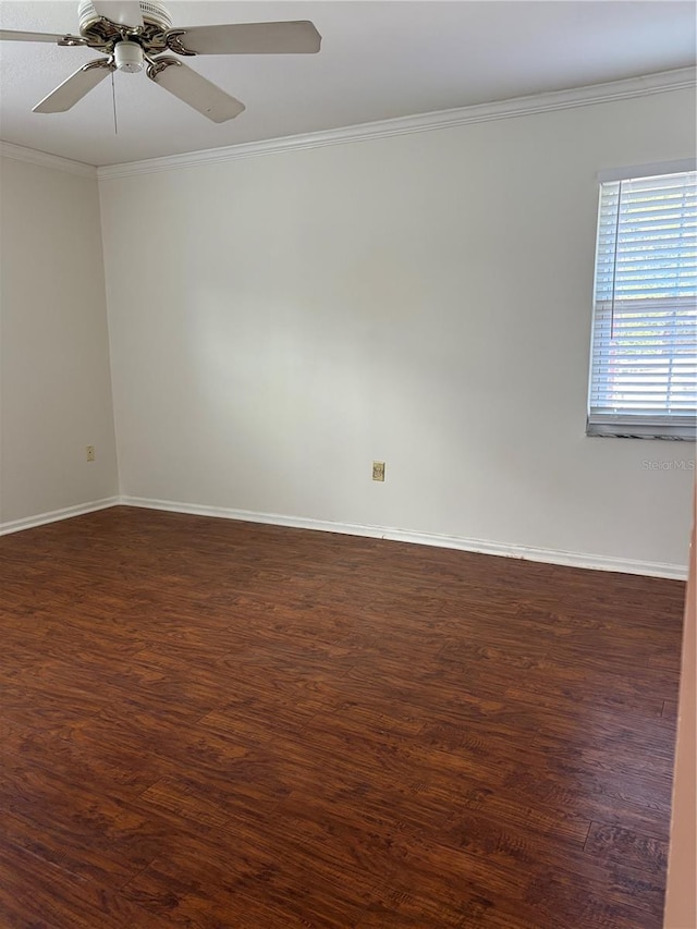 1135 Palace Pl, Lakeland, FL 33813 - spare room featuring ornamental molding, dark wood-type flooring, and a ceiling fan