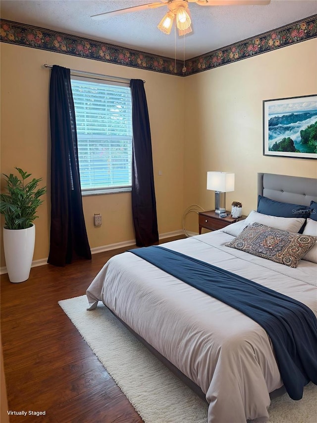 1135 Palace Pl, Lakeland, FL 33813 - bedroom with wood finished floors and a ceiling fan