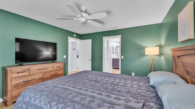 3273 Sennett Cir, Oxford, FL 34484 - bedroom with ensuite bathroom and ceiling fan