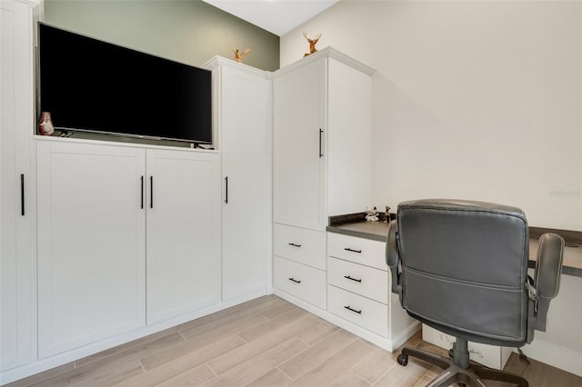 office space featuring light wood finished floors