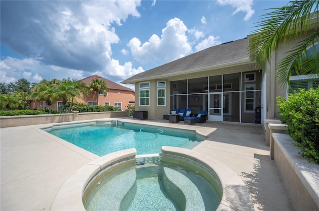 view of swimming pool featuring a patio area, an outdoor hangout area, a pool with connected hot tub, and a sunroom