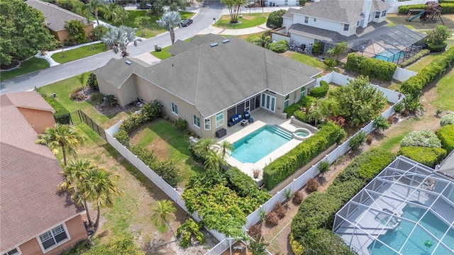 aerial view of residential area featuring a pool