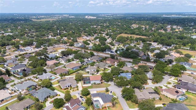 aerial overview of property's location with nearby suburban area