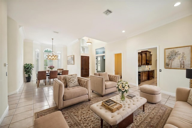 715 Hanover Ct, Lakeland, FL 33813 - living room with light tile patterned flooring, crown molding, baseboards, and recessed lighting