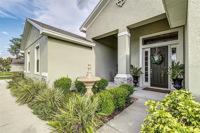 6372 English Creek Dr, Lakeland, FL 33811 - property entrance featuring stucco siding and a porch