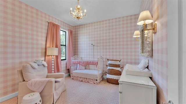 6372 English Creek Dr, Lakeland, FL 33811 - bedroom featuring a chandelier, a crib, and carpet flooring