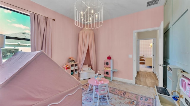 6372 English Creek Dr, Lakeland, FL 33811 - playroom featuring a chandelier