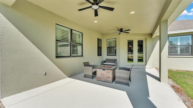 6372 English Creek Dr, Lakeland, FL 33811 - view of patio / terrace featuring french doors, a fire pit, and ceiling fan