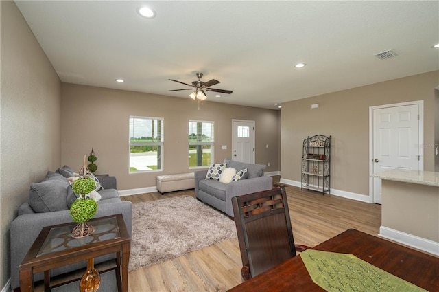 4189 Radford Rd, Bartow, FL 33830 - living room with light wood-style flooring, a ceiling fan, recessed lighting, and baseboards