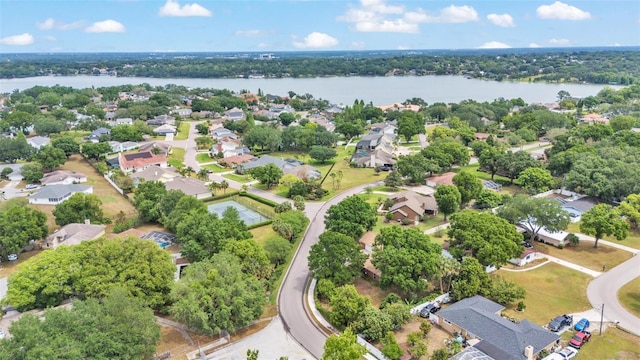 birds eye view of property featuring a residential view and a water view