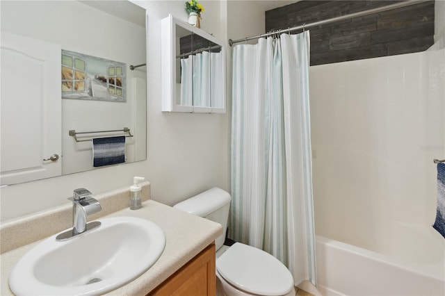 full bathroom with toilet, shower / tub combo with curtain, and vanity