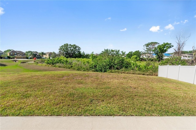 view of yard featuring fence