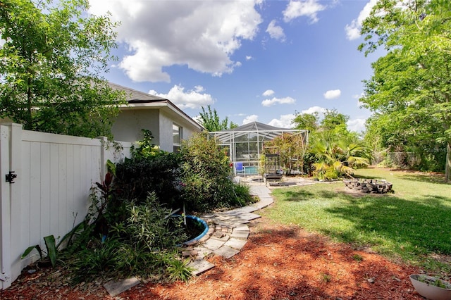 6626 Royal Forest Dr, Lakeland, FL 33811 - view of yard with a patio area, fence, and glass enclosure