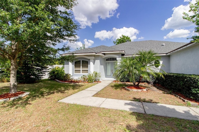 6626 Royal Forest Dr, Lakeland, FL 33811 - view of front facade with a front yard and stucco siding