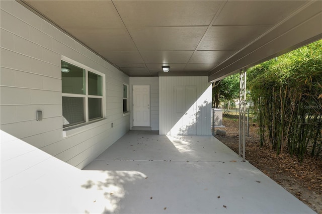 view of patio featuring an attached carport