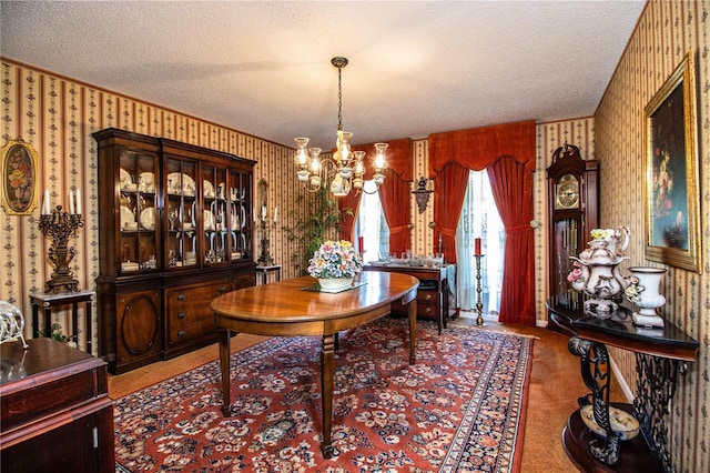4101 N Forbes Rd, Plant City, FL 33565 - carpeted dining area featuring wallpapered walls, a chandelier, and a textured ceiling